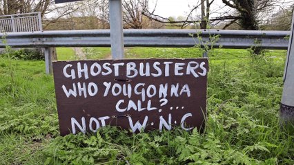 Anonymous Artist Turns Pothole Problems into Public Art with Humorous Road Signs 🚧