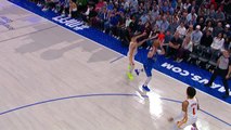 Doncic stuns Hawks with one-handed three-pointer