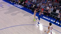 Doncic stuns Hawks with one-handed three-pointer