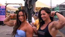Watch Two Ladies Flexing Arm Muscles_Public Event