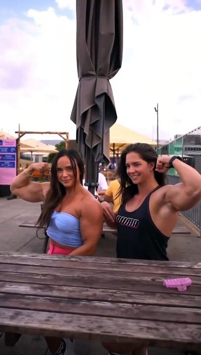 Watch Two Ladies Flexing Arm Muscles_Public Event