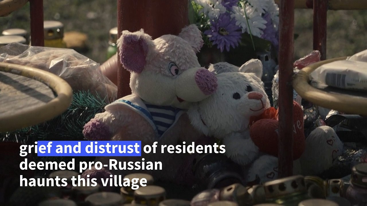 Suspicion haunts grieving Ukrainian village