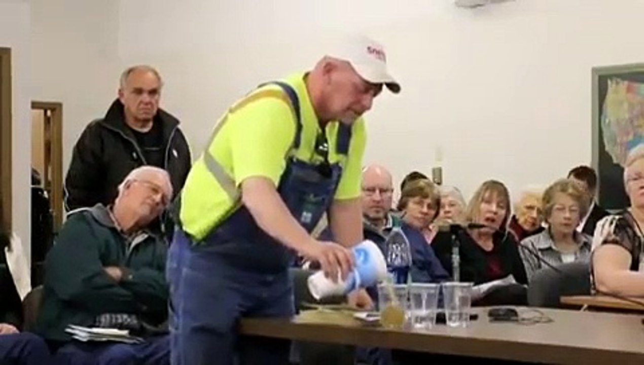 A_farmer_in_Nebraska_asking_a_pro-fracking_committ_evzmn4