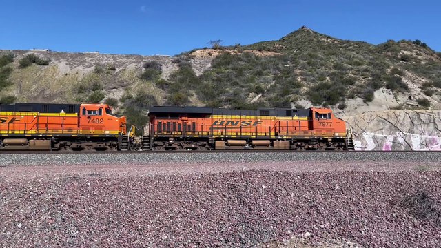 BNSF 7977 Leads Eastbound Intermodal Train Passes Through Blue Cut CA