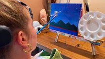 Woman paralysed after horror ski fall learns to paint with her MOUTH