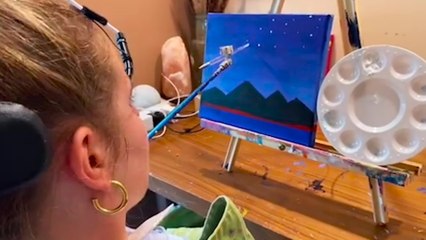 Woman paralysed after horror ski fall learns to paint with her MOUTH