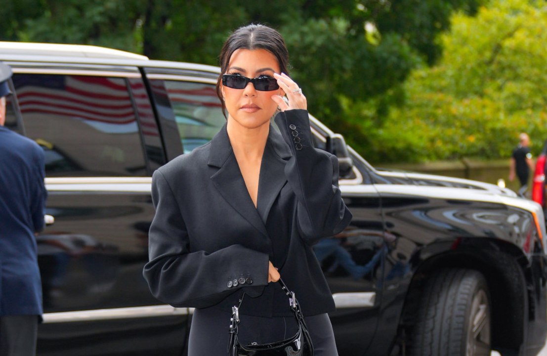 Kourtney Kardashian has slammed the unrealistic "pressure" for women