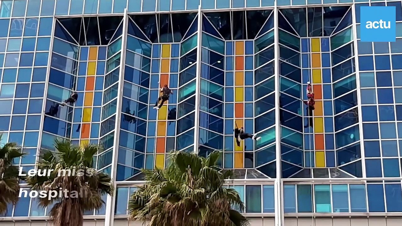Descente impressionnante de superhéros sur la façade de l'hôpital Lenval - actu Nice
