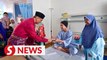 Health Minister visits patients and hospital staff on first day of Hari Raya