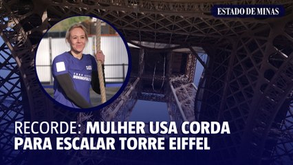 Mulher usa corda para escalar Torre Eiffel