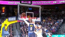 Braun switches hands mid-air to slam home