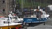 Take a look at the annual operation to crane boats back into Tenby harbour waters
