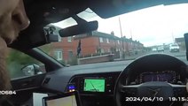 Speeding driver reverses wrong way at 60mph before he is caught by police officer - on a bike