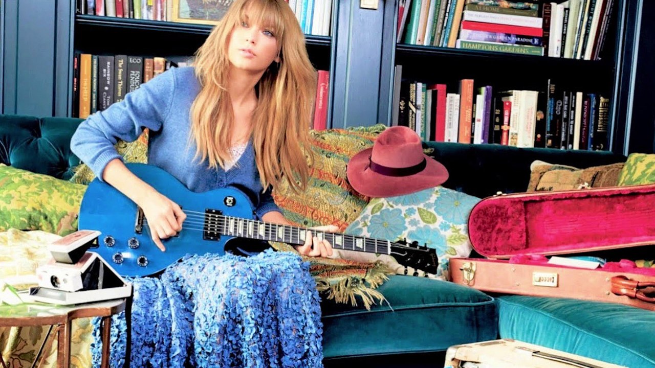 Taylor Swift Caught Teaches Travis Kelce a Guitar in her LA House
