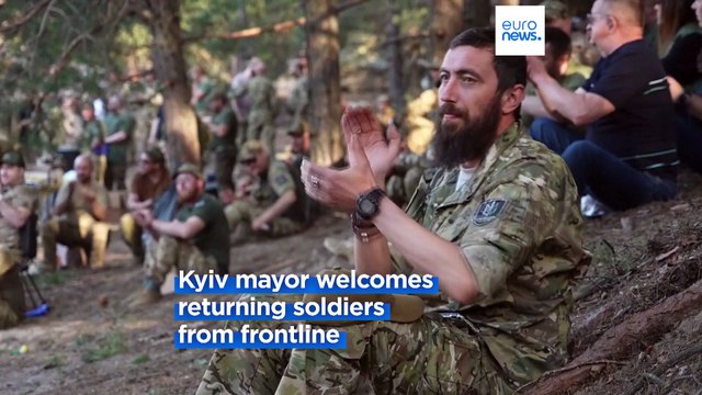 US artists paint memorial for civilians killed by Russian forces in Ukraine's Bucha