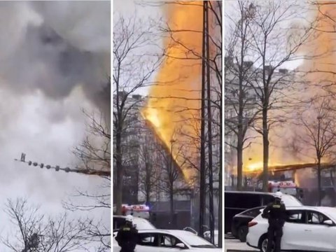 Il momento in cui crolla la storica guglia nell’incendio della borsa di Copenaghen, in Danimarca