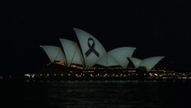 Sydney Opera House illuminated with black ribbon for shopping centre stabbing victims