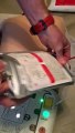 Watch as retired nurse gives step-by-step demonstration of how to use a defibrillator to save a life