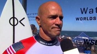 Surf legend Kelly Slater chokes back tears after loss in Australia marks ends to incredible career