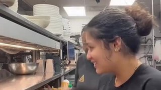 Pizza Slips Off Plate When Woman Tries to Show on Camera