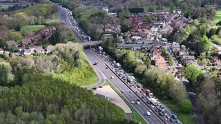 Drone footage shows A23 road closure in Sussex after car fire at Handcross