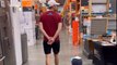 Son mimics dad's every move in the display of hero worship at Home Depot