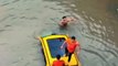 Man jumps to rescue people in submerged car