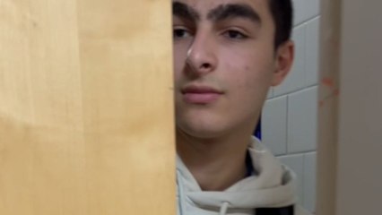 Daring lads show off the 'chilling lounge' they set up in their school bathroom