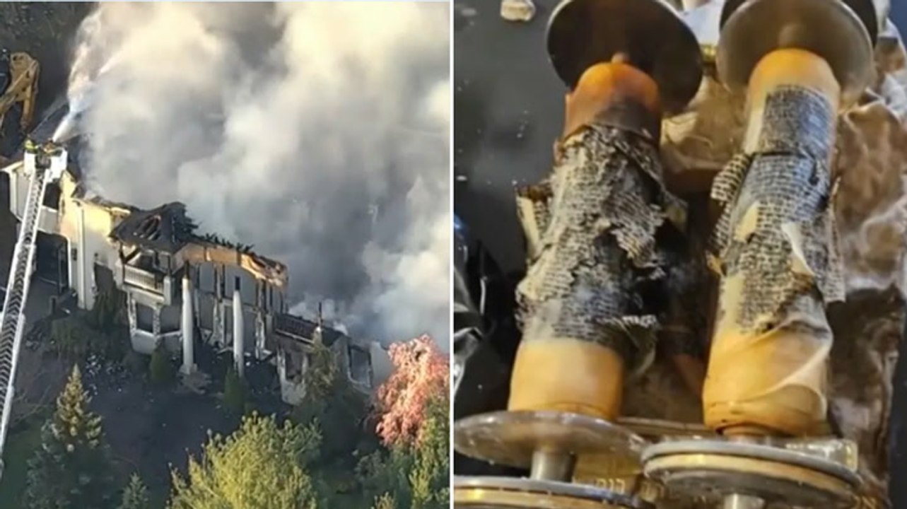 Volunteers rush to rescue Torah scrolls buried in rubble after synagogue burns down