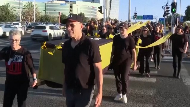 Israeli protesters carry mock coffins in call to release Gaza hostages