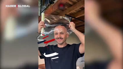 Köpeğinin tırnak bakımını yapmak için bulduğu yöntemle herkesi güldürdü