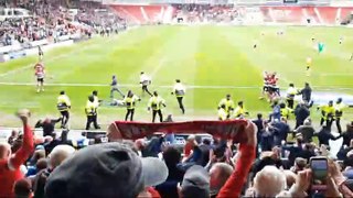 Doncaster Rovers fans invade the pitch in the incredible fightback win over Barrow