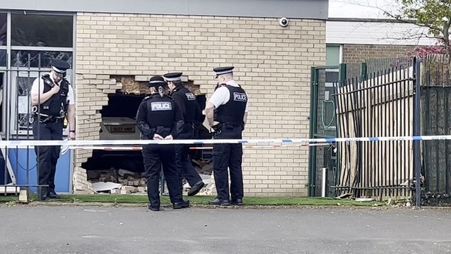 Emergency services at scene after car crashes through primary school classroom in Liverpool