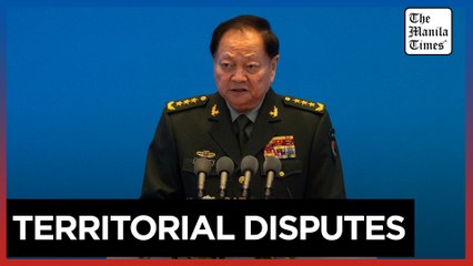 Chinese general takes a harsh line on Taiwan and other disputes at an international naval gathering