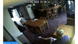 Murder accused smashes phone on pub table