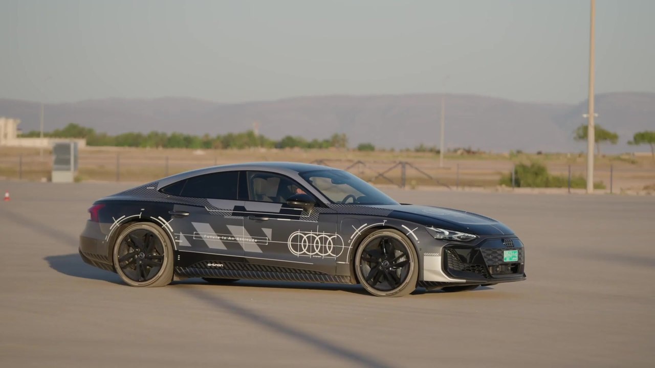The new Audi e-tron GT prototype black camouflage wrap Handling course