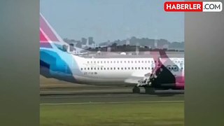 Güney Afrika'da Boeing 737 tipi uçak, kalkış sırasında tekerleği düşünce acil iniş yaptı