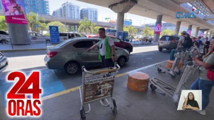 2 porter sa NAIA, isinauli ang napulot na wallet na may lamang pera