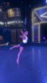 Acrobat Performs Hair Hang and Spinning Tricks