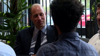 William meets 11-day-old baby during visit to skills centre