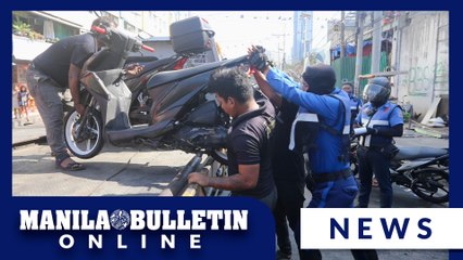 MMDA tows vehicles, confiscates furnitures in sidewalk in QC