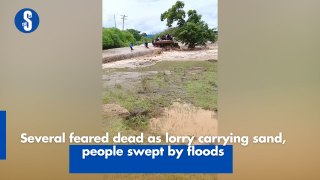 Several feared dead as lorry carrying sand, people swept by floods