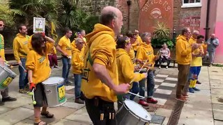 Sambalanco drumming in Hastings Old Town to raise funds towards 2025's Jack in the Green