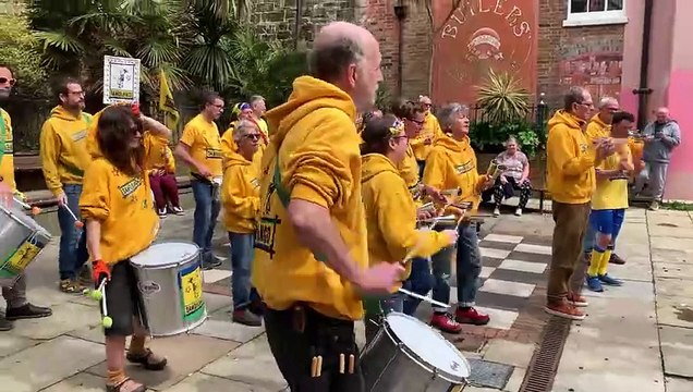 Sambalanco drumming in Hastings Old Town to raise funds towards 2025's Jack in the Green