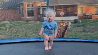 Toddler feels the electricity flowing through his head... LITERALLY!
