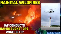 Nainital Forest Fire: Bambi Bucket being used by an IAF helicopter to fight forest fires | Oneindia