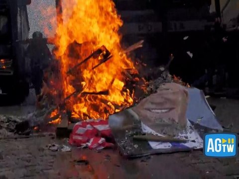 G7 a Venaria, i manifestanti danno fuoco alle gigantografie dei leader