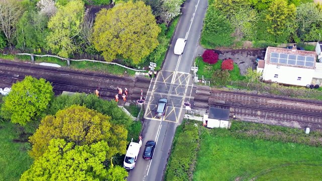 Train hits level crossing barriers at Billingshurst