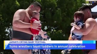 Sumo Wrestlers Taunt Toddlers in Annual Crying Baby Festival