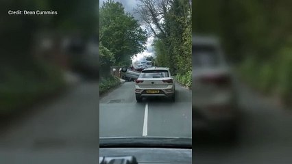 Car overturns on A21 roundabout